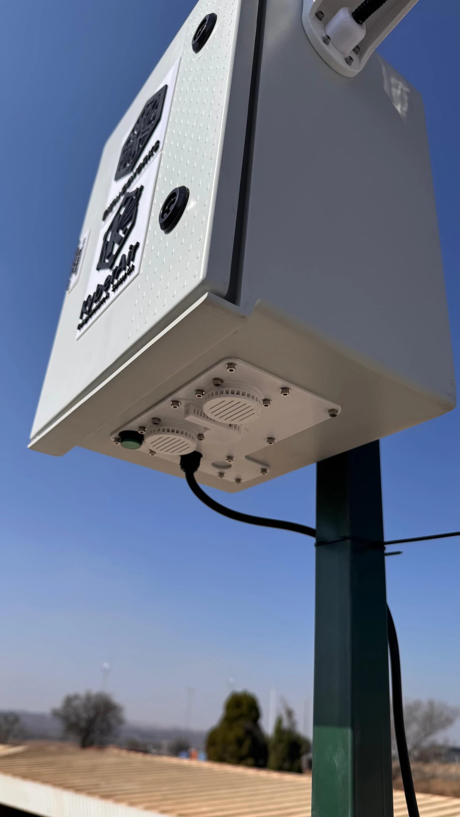 View beneath a pole-mounted KyberAir enclosure