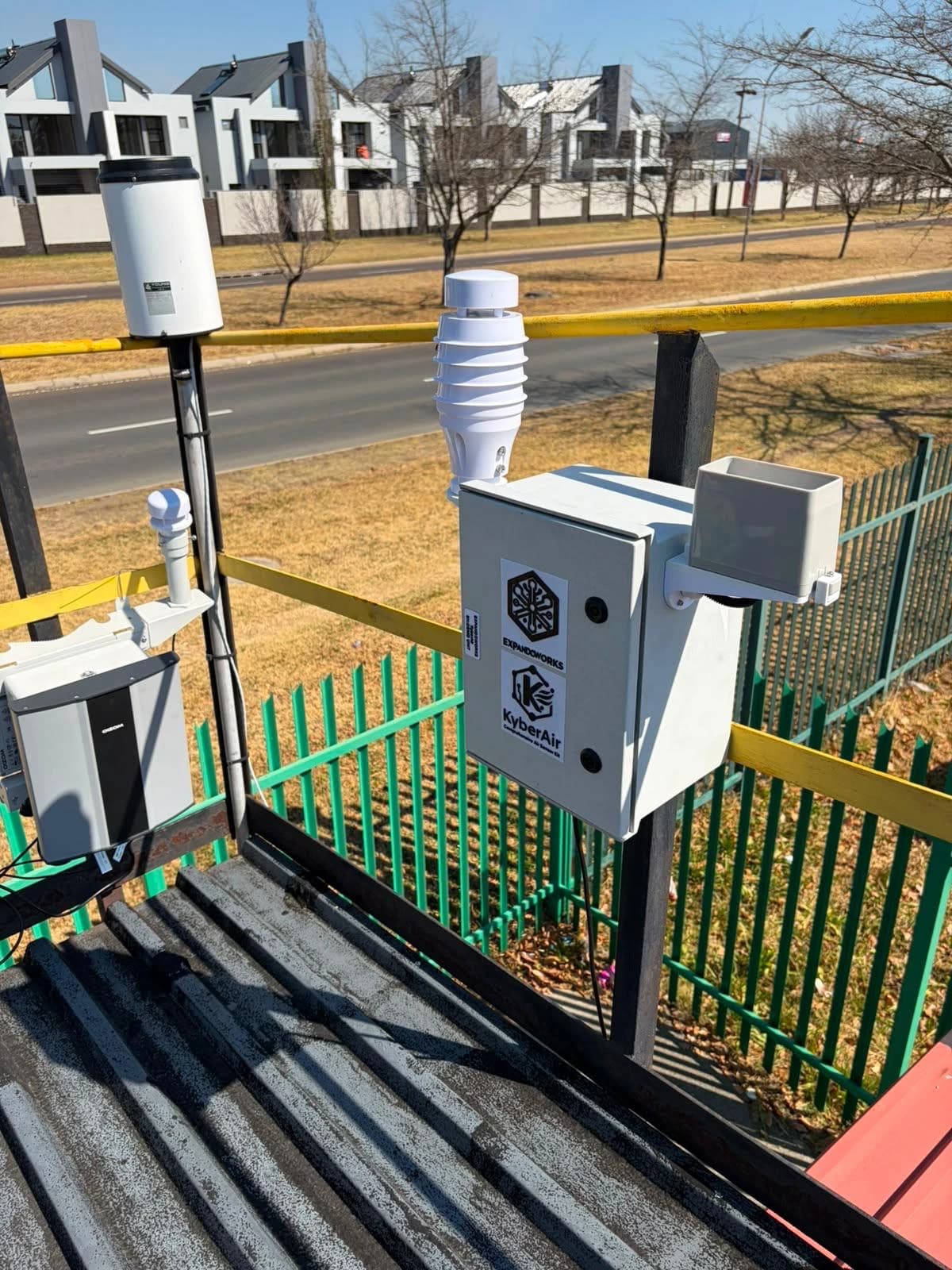 KyberAir enclosure installed alongside other outdoor monitoring equipment