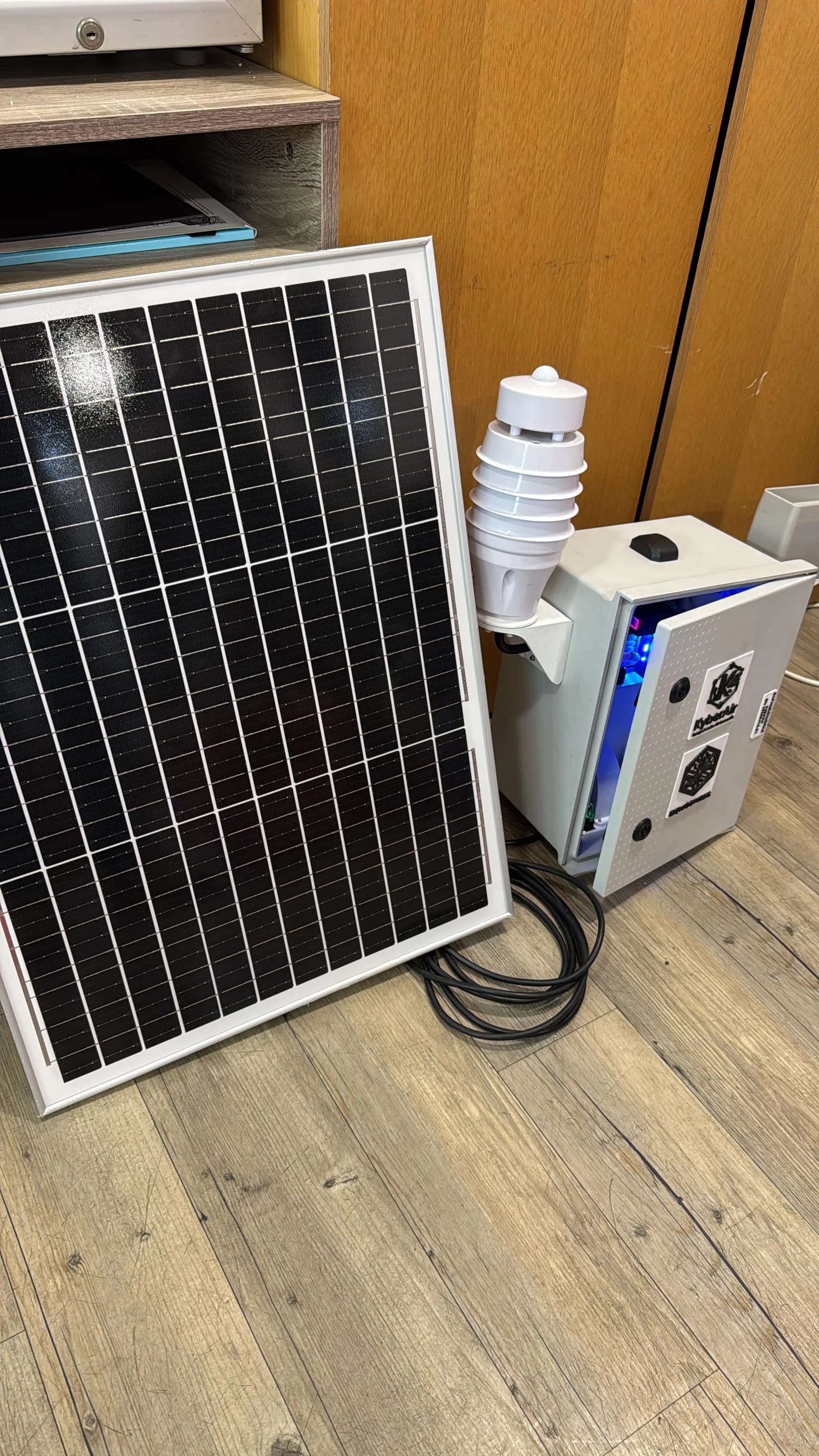 KyberAir enclosure and solar panel indoors before installation