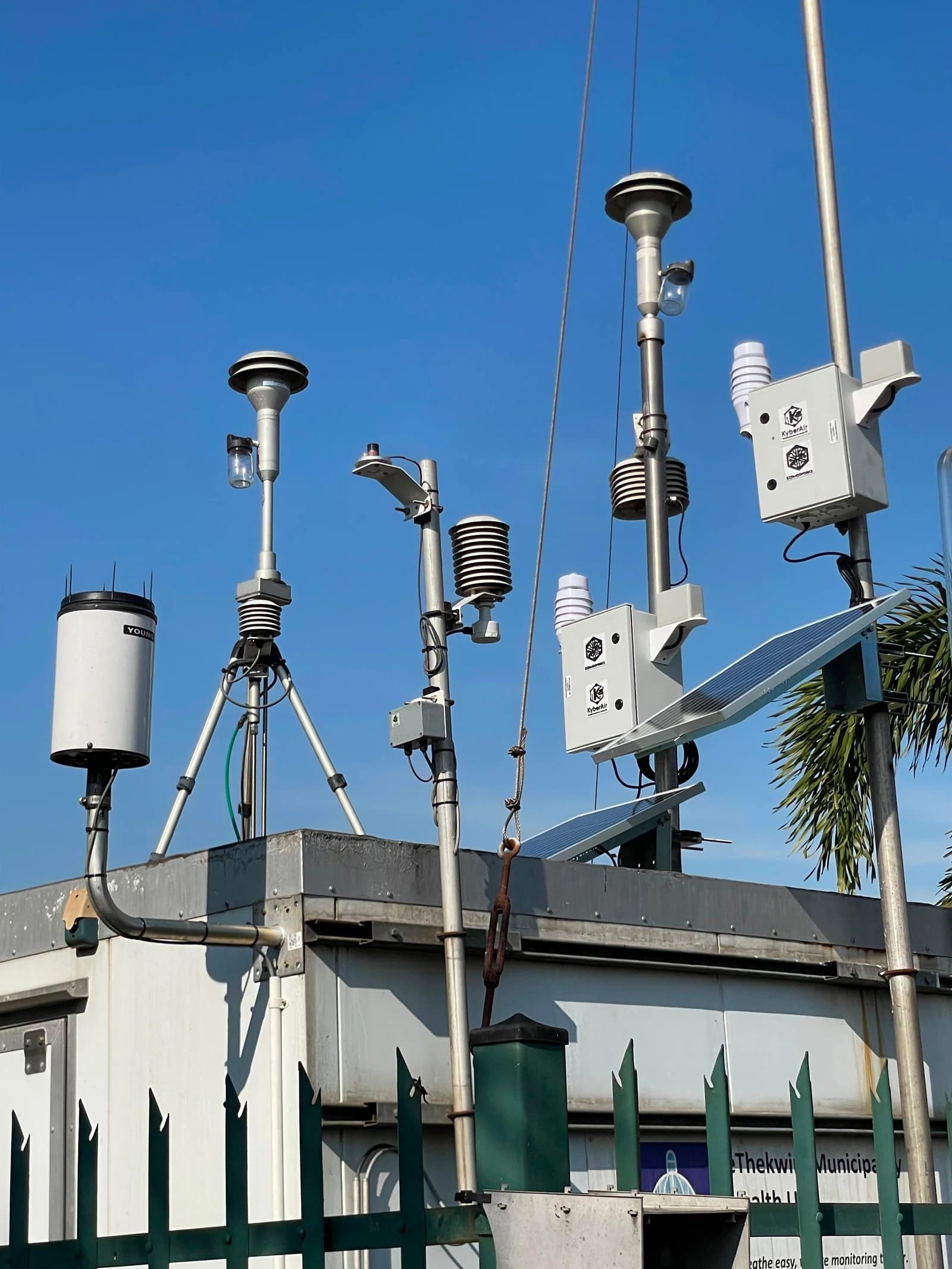 Two KyberAir units mounted beside other monitoring instruments